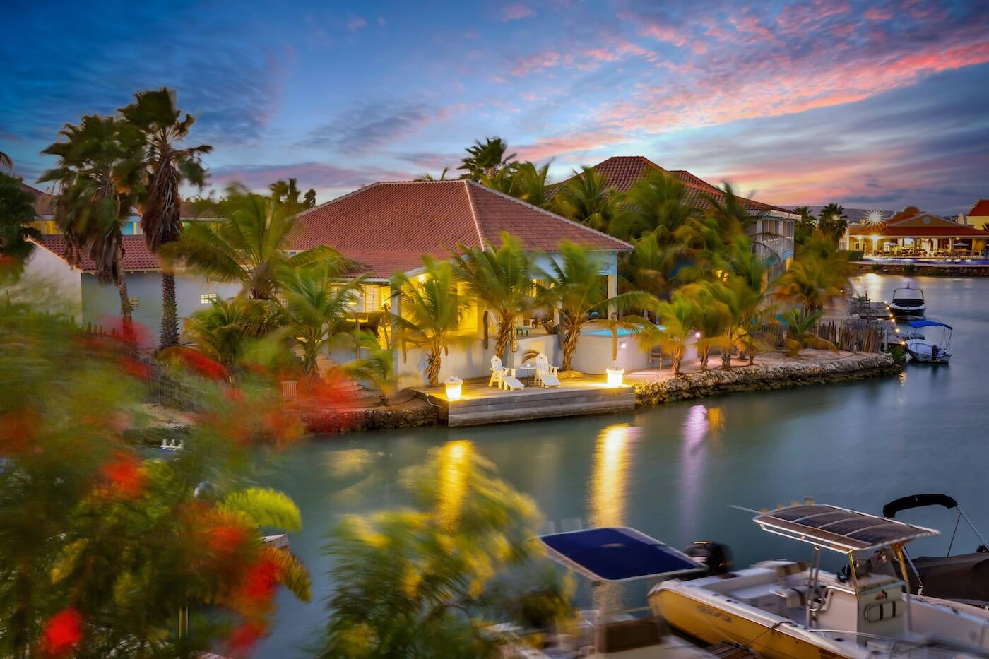 Ocean Breeze Villa with its private pool on the water in Kralendijk at sunset