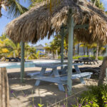 Palapa with picnic table by the Ocean Breeze pool