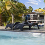 Sun loungers by the communal pool, Ocean Breeze Bonaire